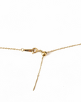 Gold necklace on a white background