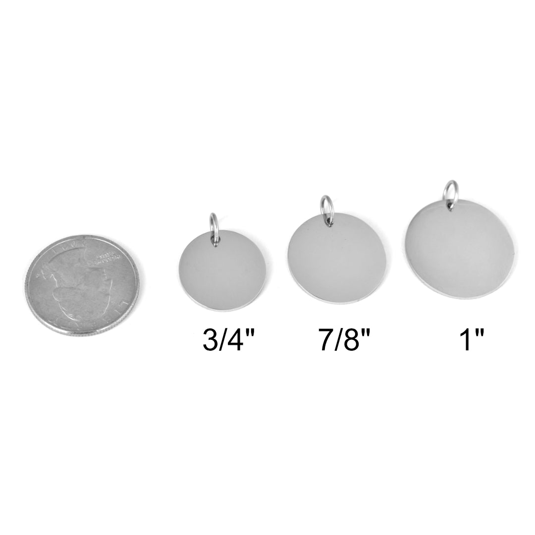 Three metal circles of different sizes next to a quarter for scale.