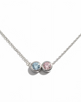 Necklace with two gemstones on a white background