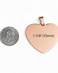 Rose gold heart-shaped pendant with measurement text on a white background