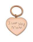 Heart-shaped keychain with 'I Love You Mom' engraving on a white background