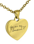 Gold heart pendant necklace with engraved text 'You are my Sunshine'