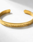 A polished gold cuff bracelet engraved with the words 'Today, tomorrow & Always' in a cursive script, displayed on a clean white background with soft shadows.