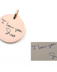 A round pendant with an engraved message that says 'I love you Sweet', alongside a close-up image of the handwritten note.