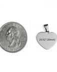 Heart-shaped pendant next to a quarter for size comparison on a white background