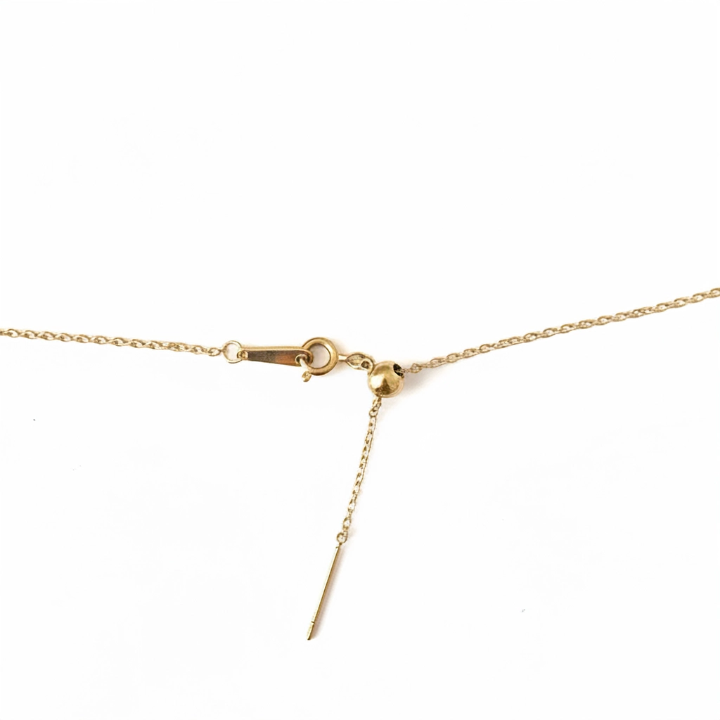 Gold necklace on a white background