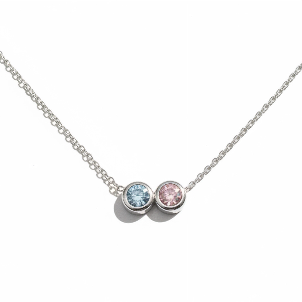 Necklace with two gemstones on a white background