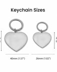 Heart-shaped keychains with measurements on a white background