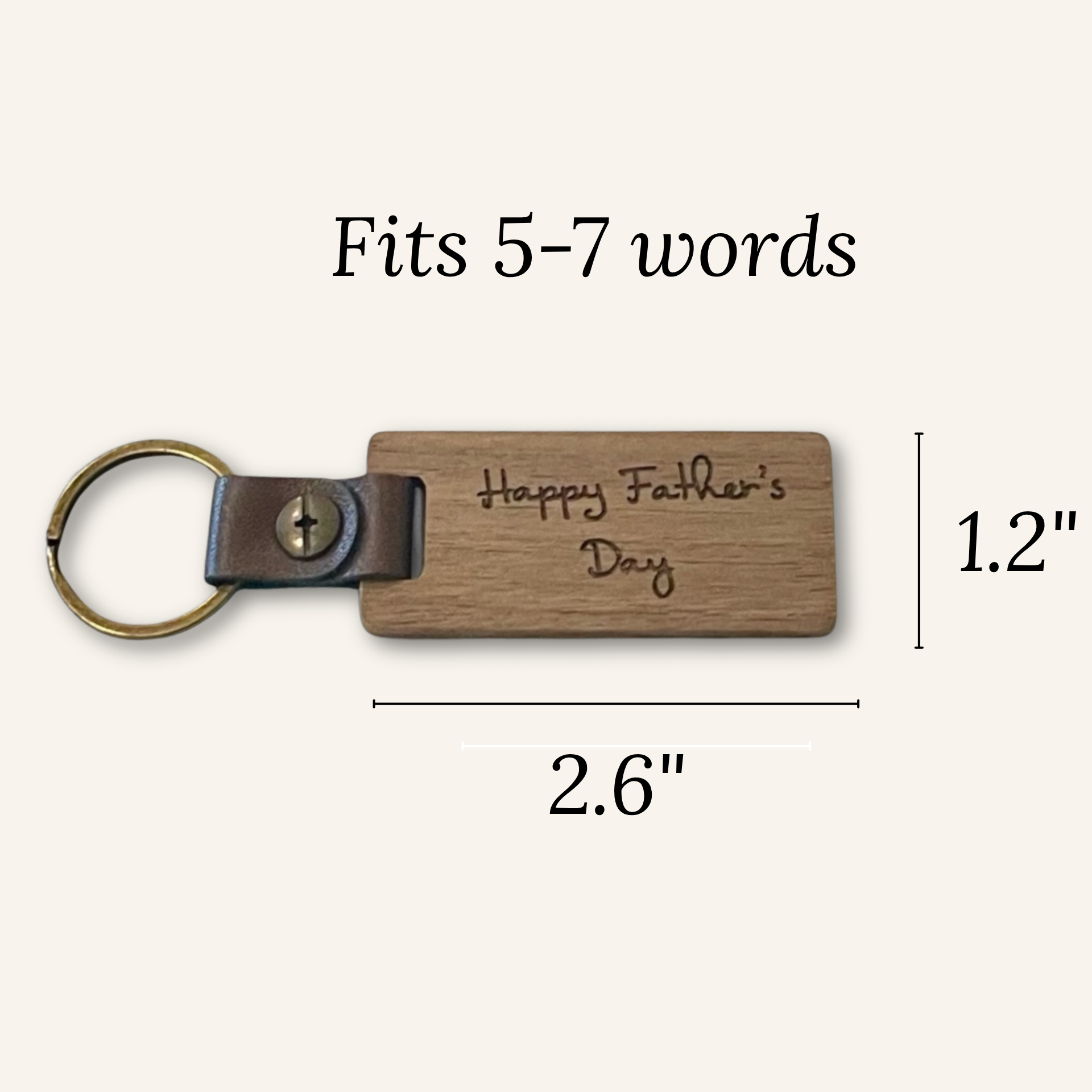 Wooden keychain with leather accent and engraved text, shown with measurements on a white background.